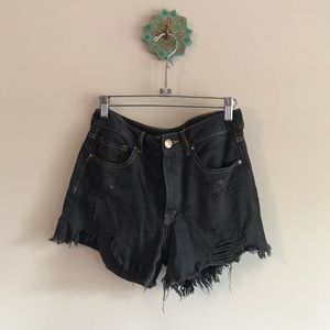 Gray/black cutoffs with yellow stitching, size 27